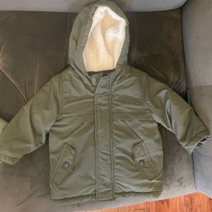 Brand New never worn but washed olive green boys hooded coat, size 12-18mth